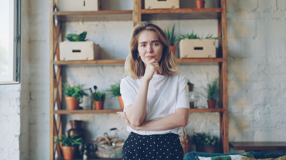 Woman considering making upgrades to her home for reasons of comfort, safety, cost and energy efficiency
